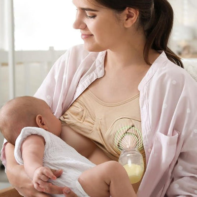 Tire-lait-manuel-Fiole-liberte-maman-bebe-boit